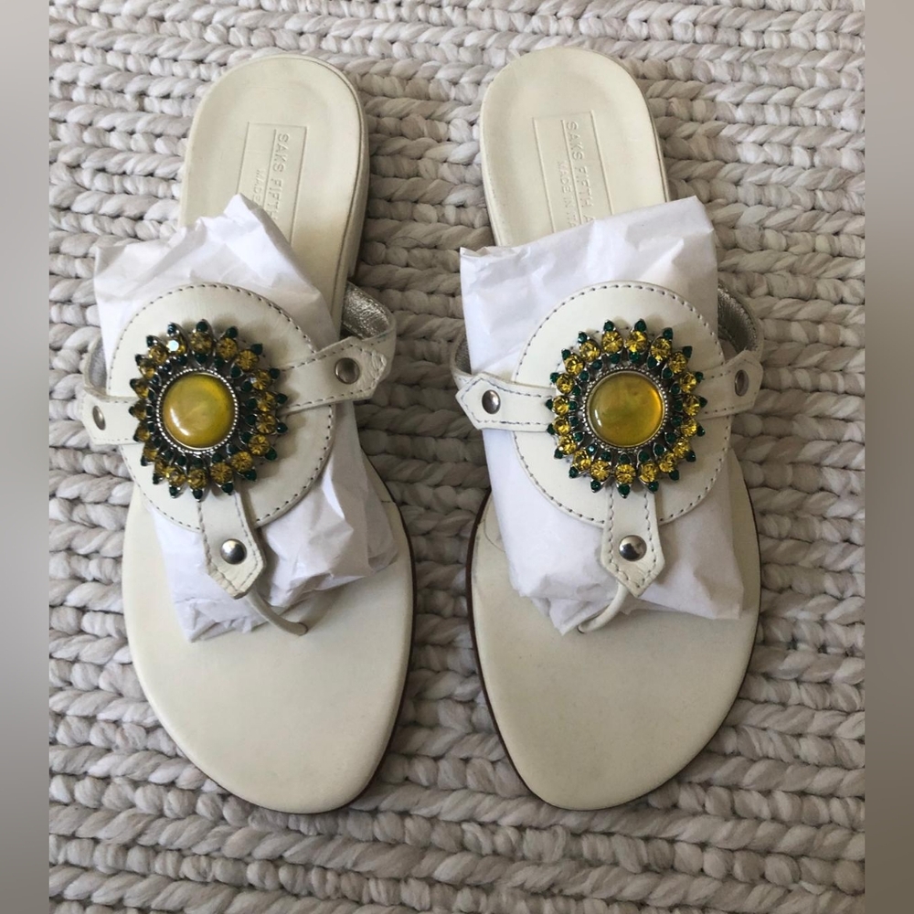 Saks Fifth Avenue leather Sandals with embellish center. New originally $275.00